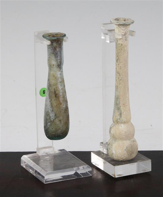 Two Roman glass unguentarium, c, 2nd century A.D., 12 and 9cm